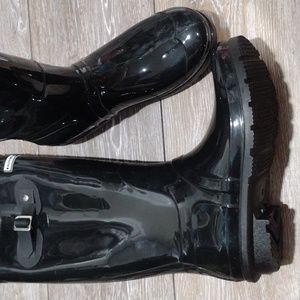 Exotic Identity black plastic rain boots. NWOT. Size 8